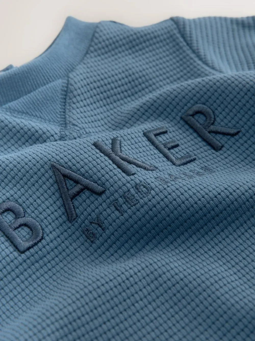 Baker by Ted Baker Textured Long Sleeve Romper^ Rompers & Overalls