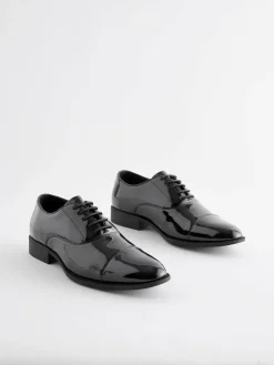 Next Black Standard Fit Patent Oxford Toe Cap Shoes^ Shoes