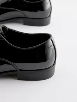 Next Black Wide Fit Patent Oxford Toe Cap Shoes^ Shoes