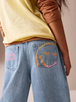 Next Mid Blue SmileyWorld® Print Wide Leg Jeans (3-16yrs)^ Jeans