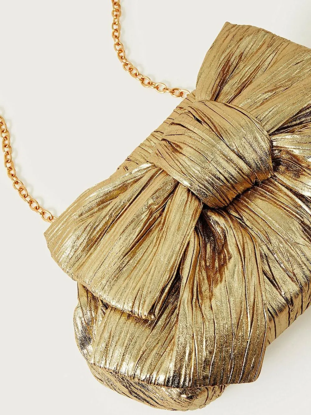 Online Monsoon Gold Tone Oversized Bow Metallic Bag