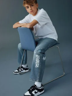 Next Varsity All-Over Print Mid Blue Denim Wide Fit Authentic Jeans (3-16yrs)^BOY Jeans|Jeans